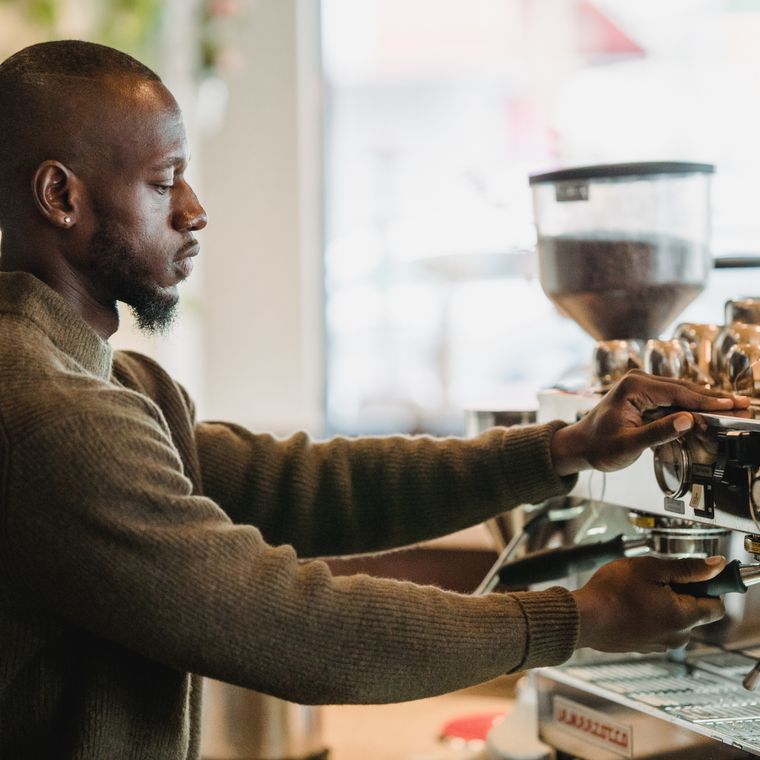 Barista at the espresso machine